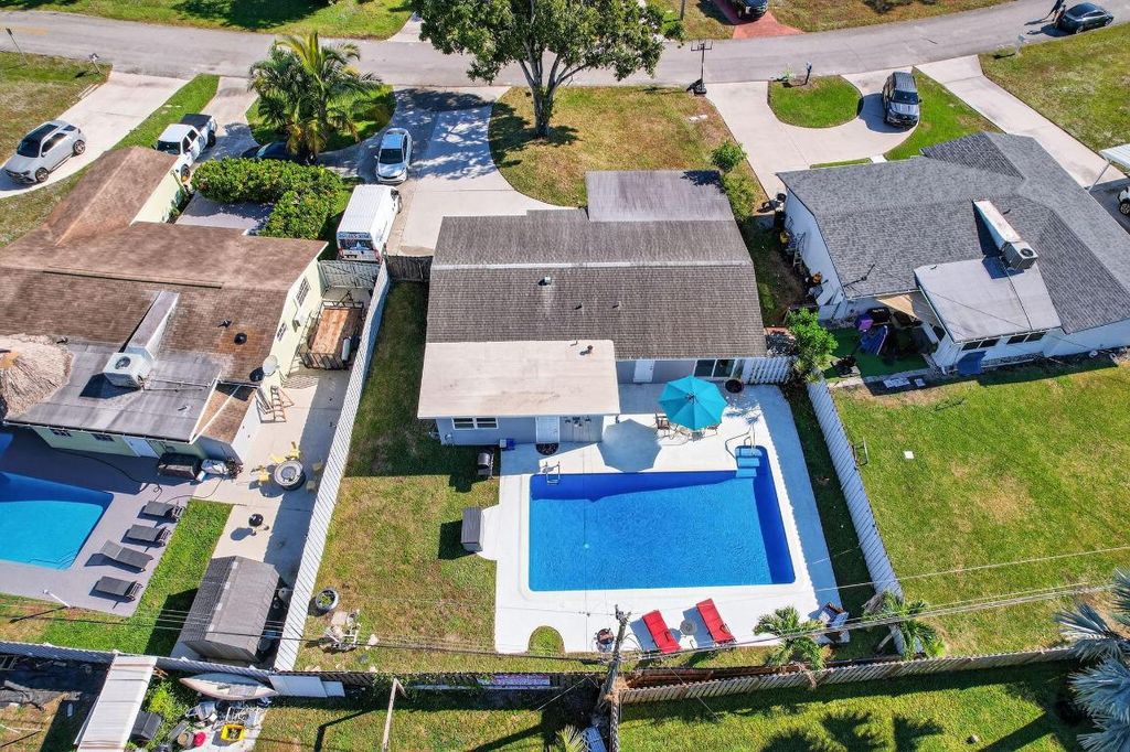 Photo of 511 Iris Avenue, Palm Beach Gardens, FL 33410 (MLS # R11143410)