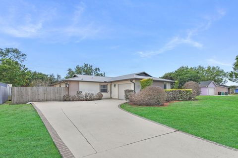 Photo of 542 NW La Brea Avenue, Port Saint Lucie, FL 34983 (MLS # B26005041)