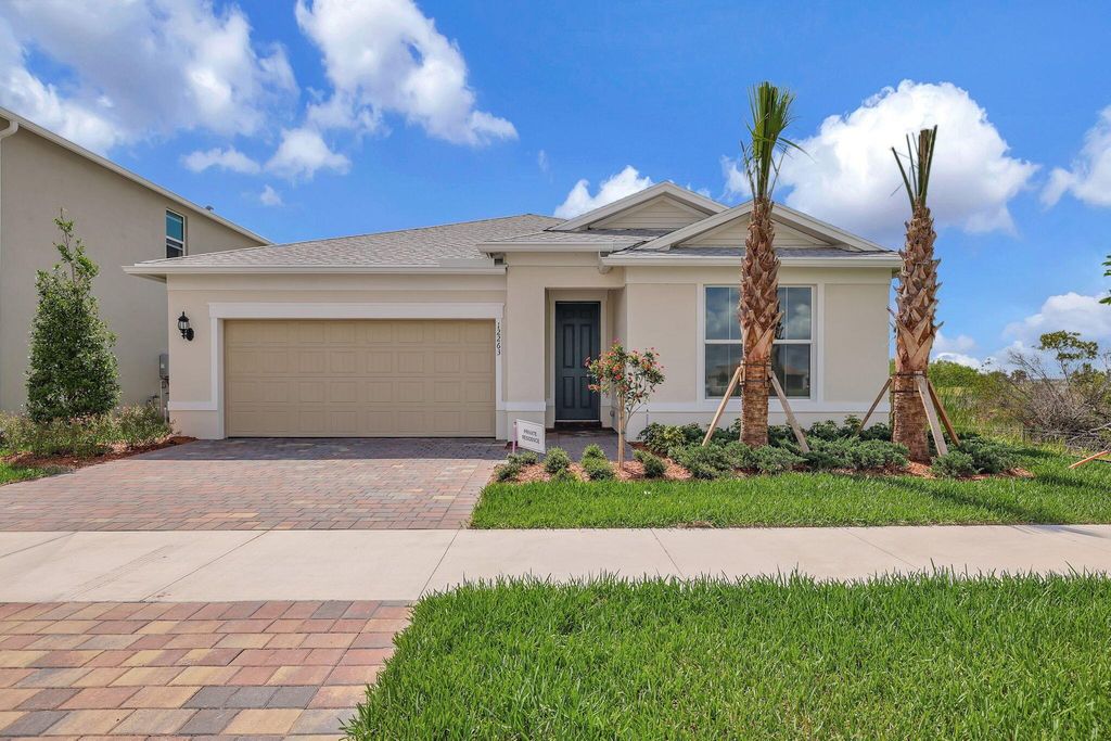 Photo of 12263 Periwinkle Court, Port Saint Lucie, FL 34987 (MLS # R10990774)