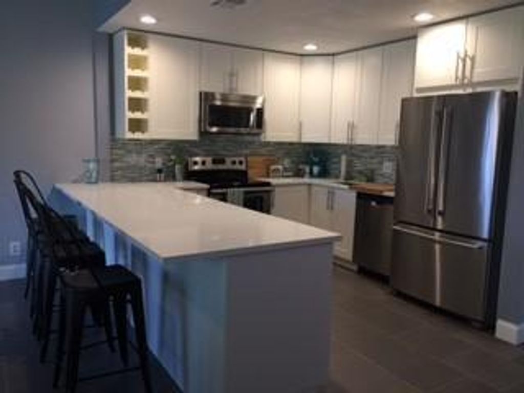 Photo of 1282 The 12th, Wellington, FL 33414 (MLS # B26010958)