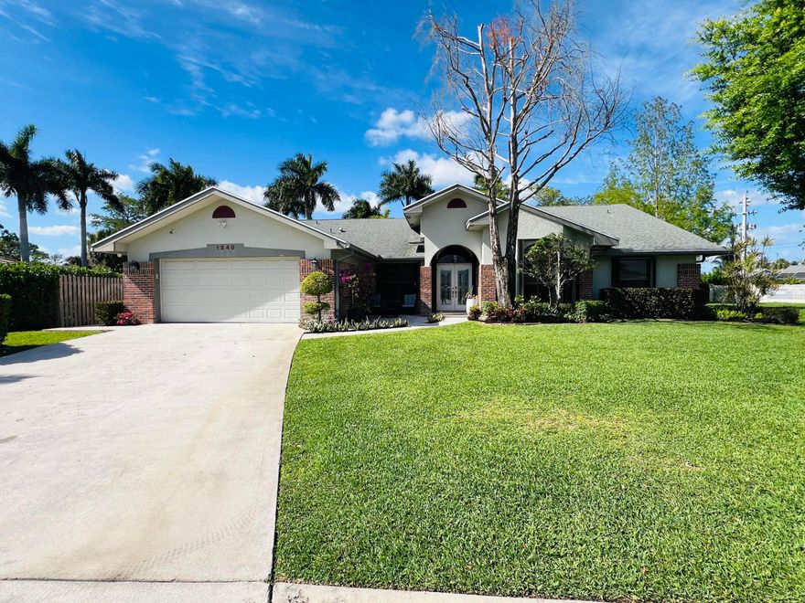 Welcome home to this beautifully maintained 4-bedroom, 2-bathroom pool home located in the desirable Greenview Shores community of Wellington! This thoughtfully cared-for home offers a spacious and functional layout featuring a large family room and a separate living room—perfect for both everyday living and entertaining. The oversized primary suite provides a relaxing retreat, while both bathrooms have been tastefully updated for modern comfort. Step outside to your private backyard oasis showcasing a massive 45x40 screened-in patio with a heated pool—ideal for year-round enjoyment. The fully fenced backyard (new in 2025) also includes a convenient storage shed and plenty of space to enjoy the Florida lifestyle. Additional highlights include full hurricane protection with impact slider  windows and accordion shutters, lush landscaping, and numerous updates, including a remodeled pool and patio (2022) and a roof installed in 2012. Best of all, there's NO HOA, and the location is hard to beat—just minutes from top-rated Wellington schools, shopping, dining, and everyday conveniences. This move-in-ready home is set in one of Wellington's most desirable neighborhoods, known for its welcoming feel and convenient lifestyle. Enjoy easy access to a nearby neighborhood park featuring a playground, basketball court, and gazebo—perfect for relaxing or spending time outdoors. A wonderful place to call home!