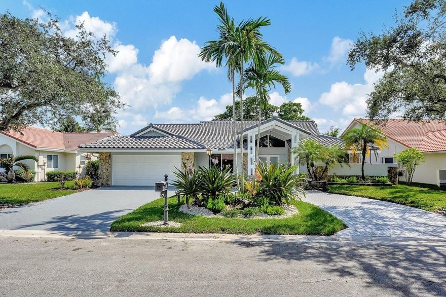 This stunning 4-bedroom, 3 bathroom home has undergone a total renovation, ensuring modern comfort and style. From the brand-new roof to impact windows. Every detail has been meticulously updated. The kitchen is designed with white cabinetry, quartz counters and stainless appliances. Tile floors in living area, new laminate in bedrooms. A spacious open layout designed for comfort and elegance, a pool with a spacious yard for relaxation, a 2 car garage and separate laundry room. The community is gated in an amazing neighborhood. An absolute must see!
