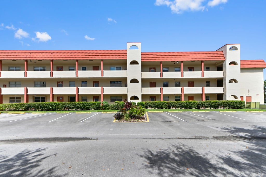 Photo of 3091 E Sunrise Lakes Drive #302, Sunrise, FL 33322 (MLS # B26060185)