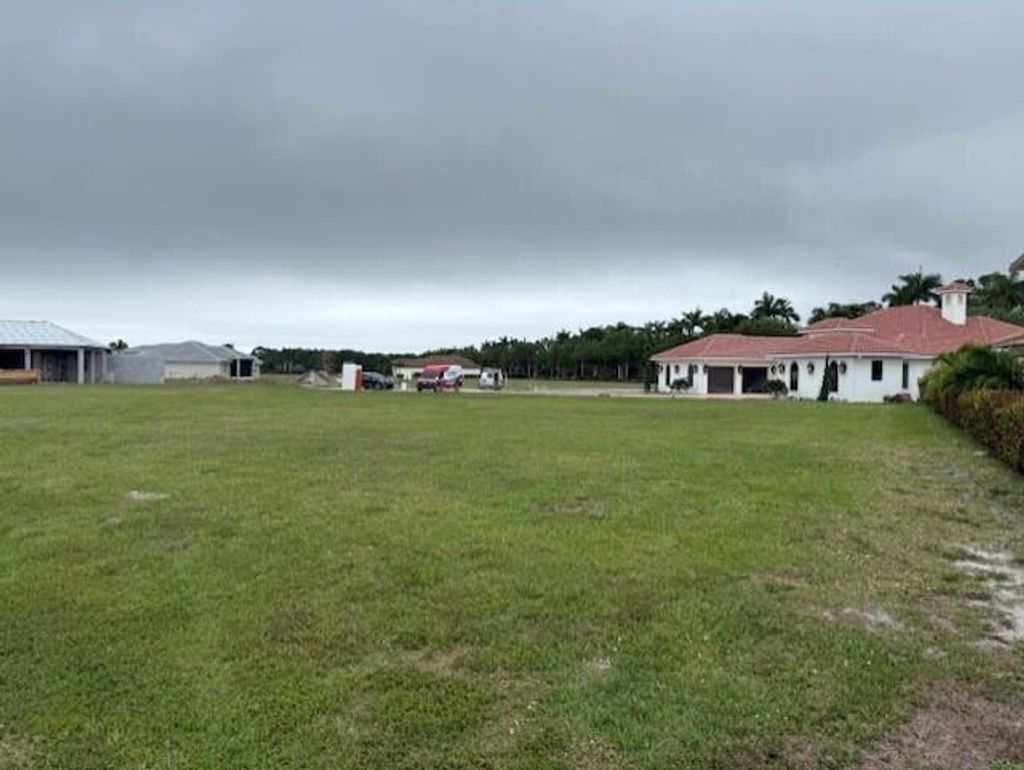 Photo of 171 SE Via Lago Garda, Port Saint Lucie, FL 34952 (MLS # R11080794)