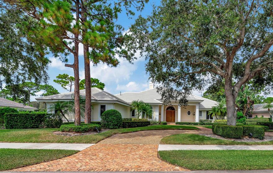 A welcoming entry features arched windows and French doors which allow for abundant natural light to spill into the main living area of this charming three bedroom, four and a half bath estate home in Loblolly Pines. This home features coffered and volume ceilings, marble flooring an eat-in kitchen with adjoining family room and access to the covered loggia, private pool and yard. The stately master suite is sure to impress with a generously sized walk-in closet and it's own access to the private outdoors. Both generously sized guest rooms are complete with en-suite baths. The convertible office/den features custom knotty pine built-ins, full bath, spacious closets and an opportunity for a fourth bedroom.