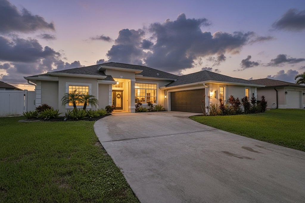 Photo of 1718 SW Penrose Avenue, Port Saint Lucie, FL 34953 (MLS # B26071327)
