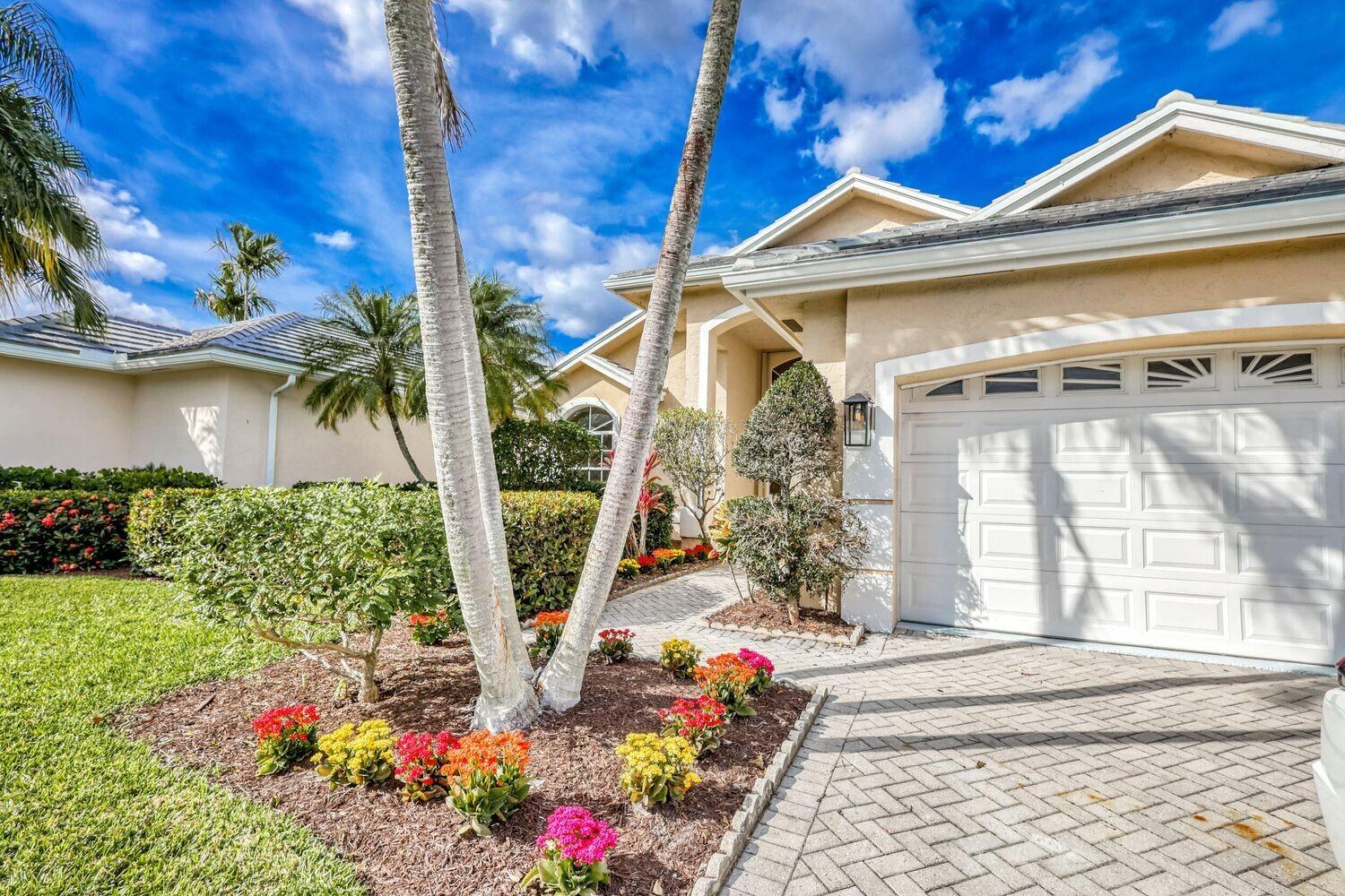 WELCOME to an expansive single-level newly renovated modern home w/ 4 bedrooms, 3 en-suite bathrooms (+ half bath). Includes screened, heated pool & spa located directly on the golf course w/ amazing sweeping lake & course views, + privacy landscaping. Everything is brand new including an amazing open kitchen w/ soaring ceiling, attached 2-car garage, stainless steel appliances, gas stove, wet bar, wine refrigerator & rack, ''spa-like'' master bathroom w/ powered lit mirrors, soaking tub, rainfall shower, heated towel rack & private water closet. Located in a private enclave inside of Ironhorse CC, a 24-hour guard gated community, offering endless nature, golf and lakes. Access to private PGA National amenities available and the ability to pay as you play on 6 courses.