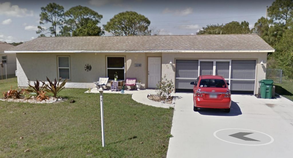 Photo of 750 NW Bristol Street St, Port Saint Lucie, FL 34983 (MLS # R10810932)