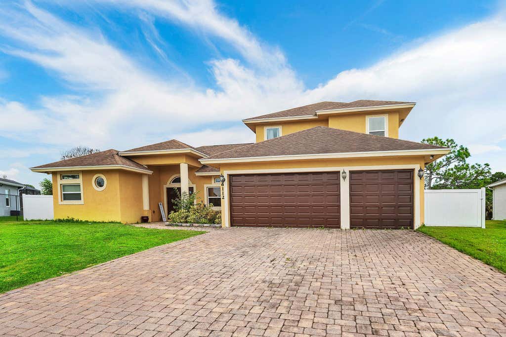 Photo of 6112 NW GINGER Lane, Port Saint Lucie, FL 34986 (MLS # B26061972)