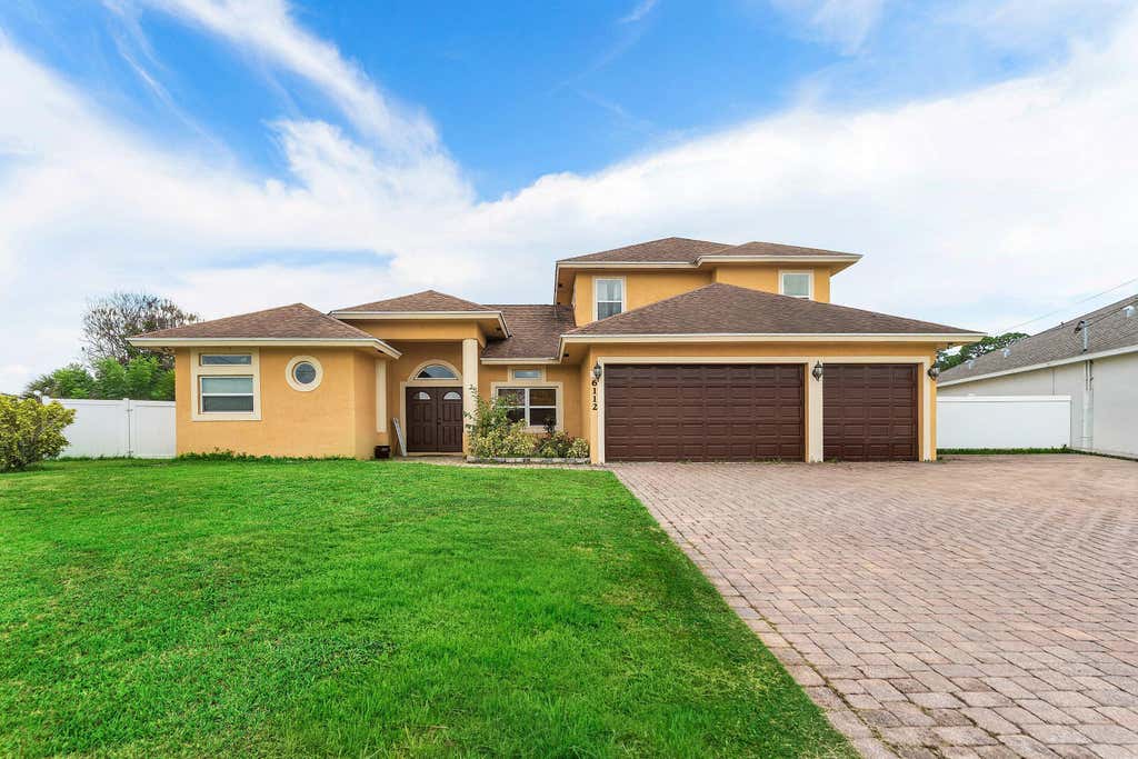 Photo of 6112 NW GINGER Lane, Port Saint Lucie, FL 34986 (MLS # B26061972)