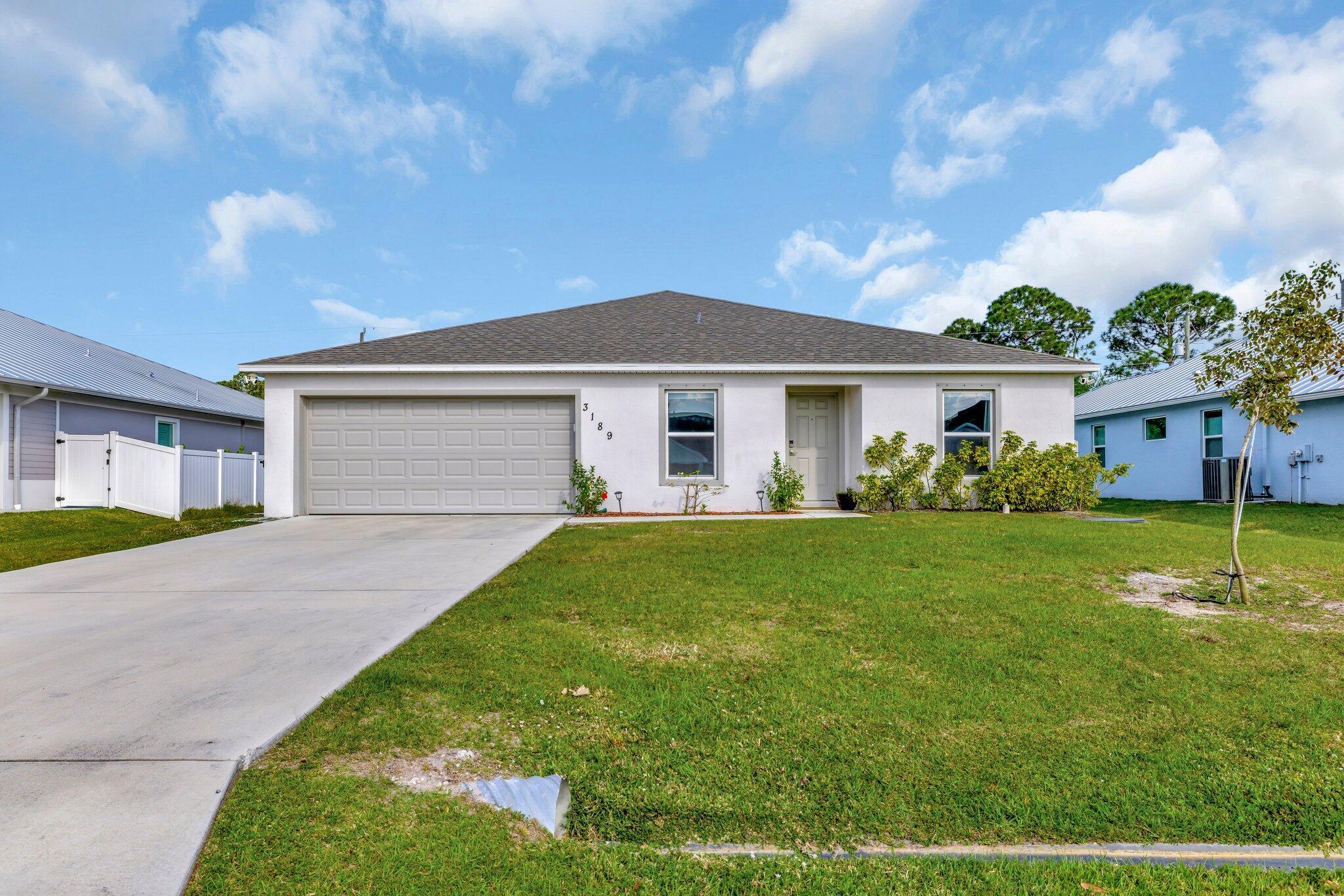 Beautiful 4-bedroom, 2-bathroom home built in 2021, nestled in the desirable Gatlin area. Featuring a 2-car garage and newly installed tile flooring, this home offers both style and convenience. Just minutes from Tradition, you'll enjoy easy access to shopping, dining, and major highways. This home is also within walking distance of Peacock Park, a scenic 75-acre lake perfect for biking, fishing, boating, or a peaceful stroll. 1st, last, and security