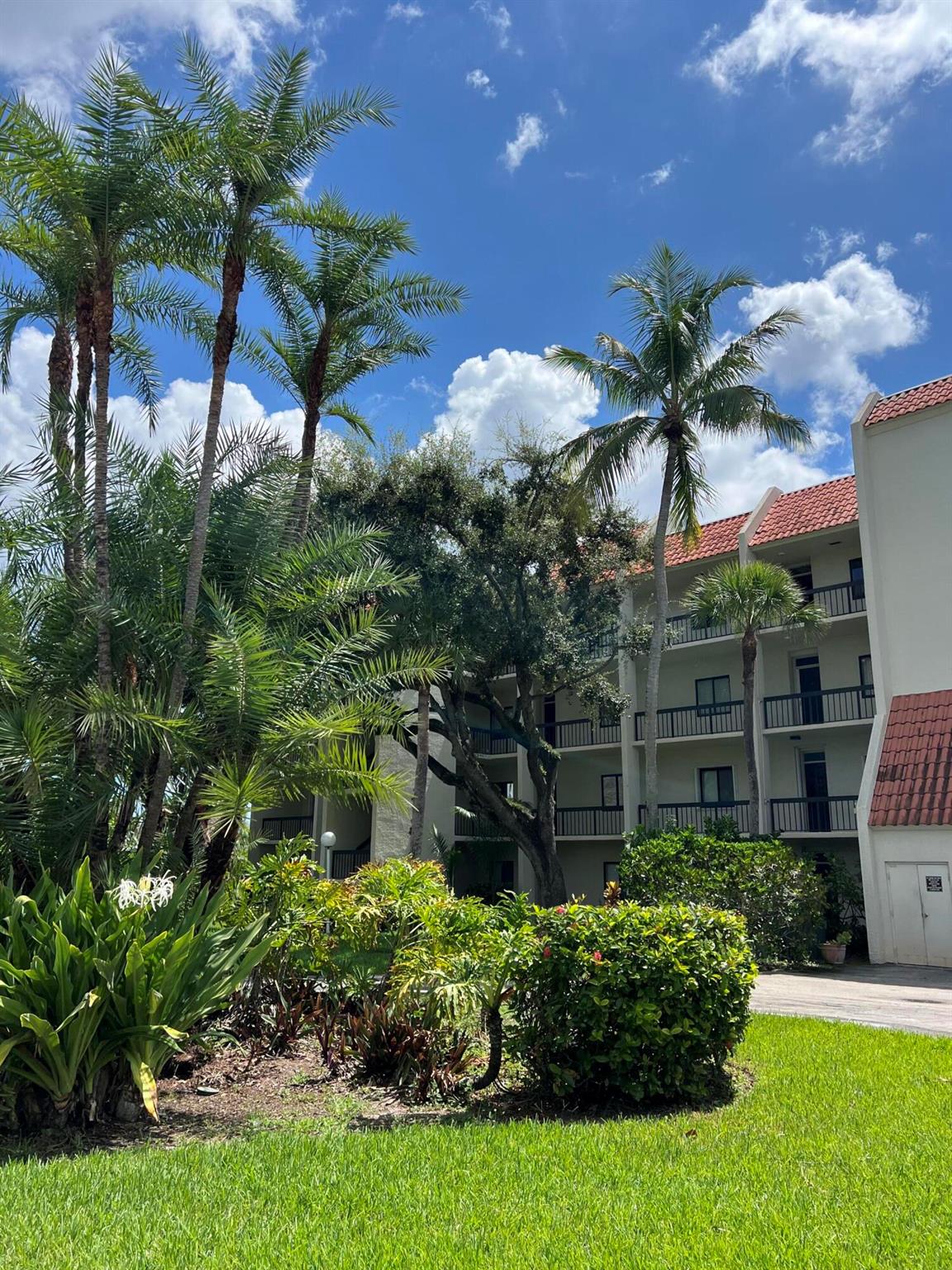 Welcome to your serene South Florida retreat! This beautifully maintained 2-bedroom, 2-bathroom condo offers comfort, convenience, and style in a prime West Palm Beach location. Enjoy the relaxing views of lush palm trees, manicured landscaping, and tranquil lake vistas from your private living space.Inside, you'll find a spacious and functional layout with in-unit washer and dryer, making everyday living a breeze. The unit is conveniently located close to the elevator, ideal for easy access. Fully equipped with impact windows and doors, this home offers peace of mind, energy efficiency, and noise reduction.Located within a 24-hour gated community, residents enjoy access to resort-style amenities including a sparkling pool and beautifully maintained grounds.