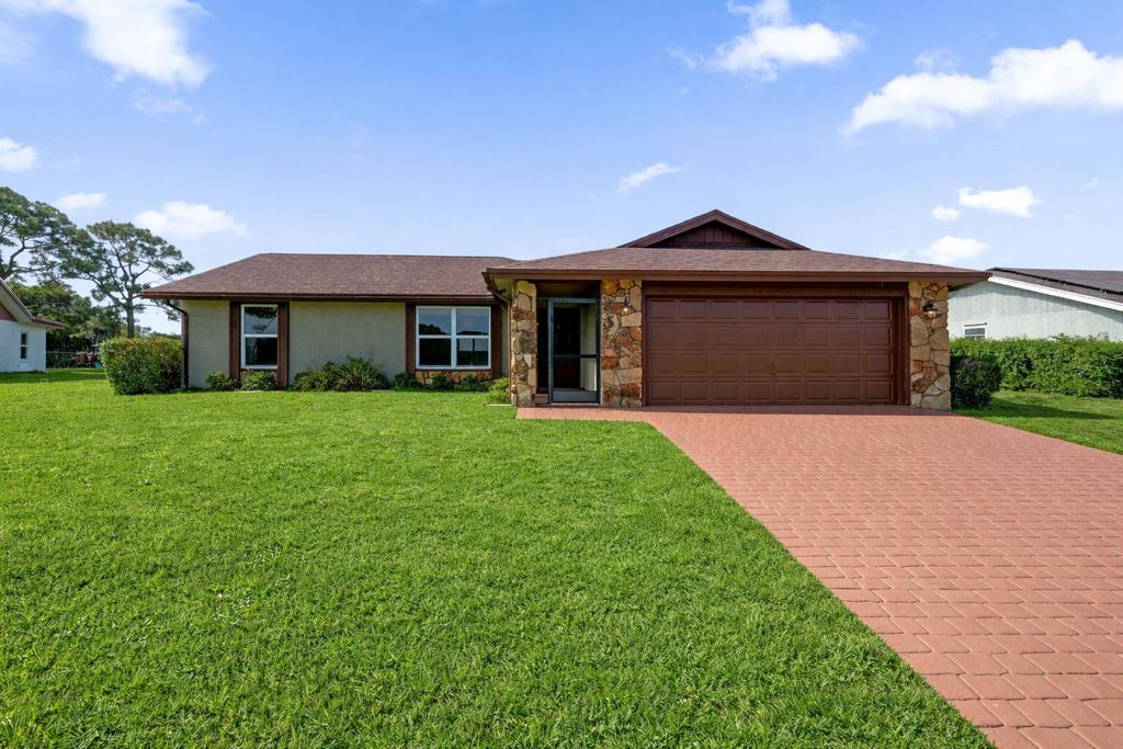 Photo of 140 Miramar Avenue, Royal Palm Beach, FL 33411 (MLS # B26012661)