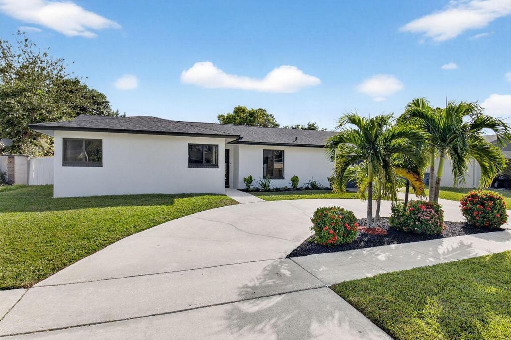 Photo of 10151 Windtree Lane N, Boca Raton, FL 33428 (MLS # R11144018)