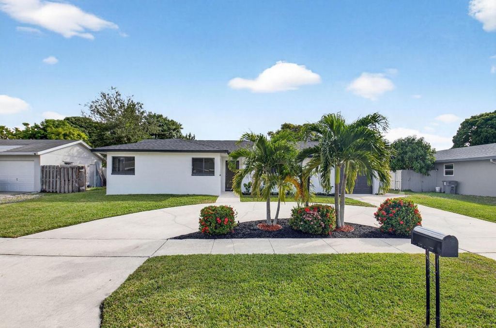 Photo of 10151 Windtree Lane N, Boca Raton, FL 33428 (MLS # R11144018)