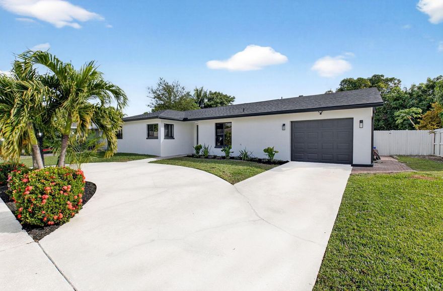 Welcome to this beautifully updated Boca Raton home with no HOA, perfect for families seeking comfort and convenience. Renovated with a 2025 roof, 2025 impact windows and doors, new AC, and new irrigation system, it offers true peace of mind. Inside, the bright, open layout features an open kitchen with quartz countertops and brand-new appliances. The big, fully fenced backyard is ideal for kids and pets, with a sparkling pool and plenty of grassy space. Located near top-rated Boca Raton schools. A circular driveway and oversized garage with epoxy floor and AC for added ease and storage space. Move-in ready and designed for enjoyable Florida living. ***The property is virtually staged***