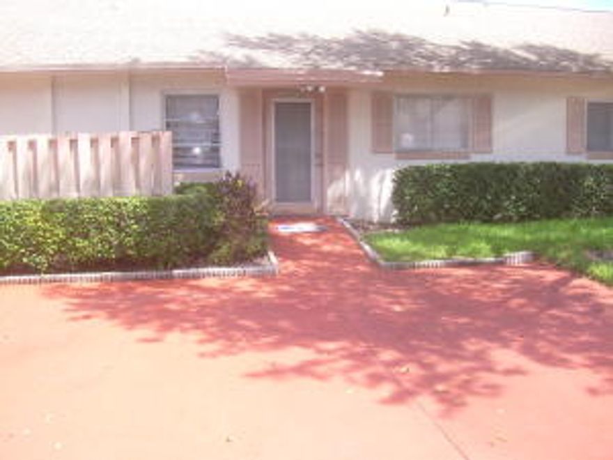 Whisper Walk gem with amazing wide lake views so picture yourself sitting & relaxing on the screened enclosed patio overlooking this tranquil lake.  Updated, light, bright & spacious villa freshly painted, neutral ceramic tile floors in main areas, newer carpeted bedrooms, upgraded bathrooms, all new kitchen appliances & new a/c (3 mos. new), interior utility room with full size washer & dryer, ceiling fans, double driveway for parking 2 cars at your front door. Wonderful community amenities including clubhouse, pools, tennis courts, etc. ready for you to enjoy the Florida lifestyle you deserve.  Ideally located in West Boca close to nearby shopping, restaurants, library, hospitals, major highways, downtown Boca and the beach.