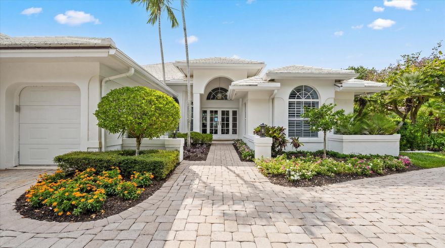 Welcome to 116 Echo Drive, an exceptional 3 bedroom 3.5 bath residence nestled within the prestigious The Loxahatchee Club—one of the nation's most coveted private communities, ranked #17 among America's most exclusive golf and country clubs by Forbes. This beautifully maintained home underwent a comprehensive renovation in 2015 including a new roof, impact-resistant glass, remodelled kitchen & family room, updated lighting and all new baths. The chef's kitchen was redesigned with new cabinetry and countertops, offering both style and functionality. A spacious Florida room  along with phantom screens create a seamless indoor-outdoor living experience.   Outdoors, lush, mature landscaping surrounds the home, complemented by an electric awning—perfect for enjoying Florida's year-round  sunshine. Additional highlights include a spacious two-car garage plus a dedicated golf cart bay, as well as a whole-house generator for peace of mind. This is a rare opportunity to own a meticulously updated home in one of Jupiter's most exclusive and sought-after communities.