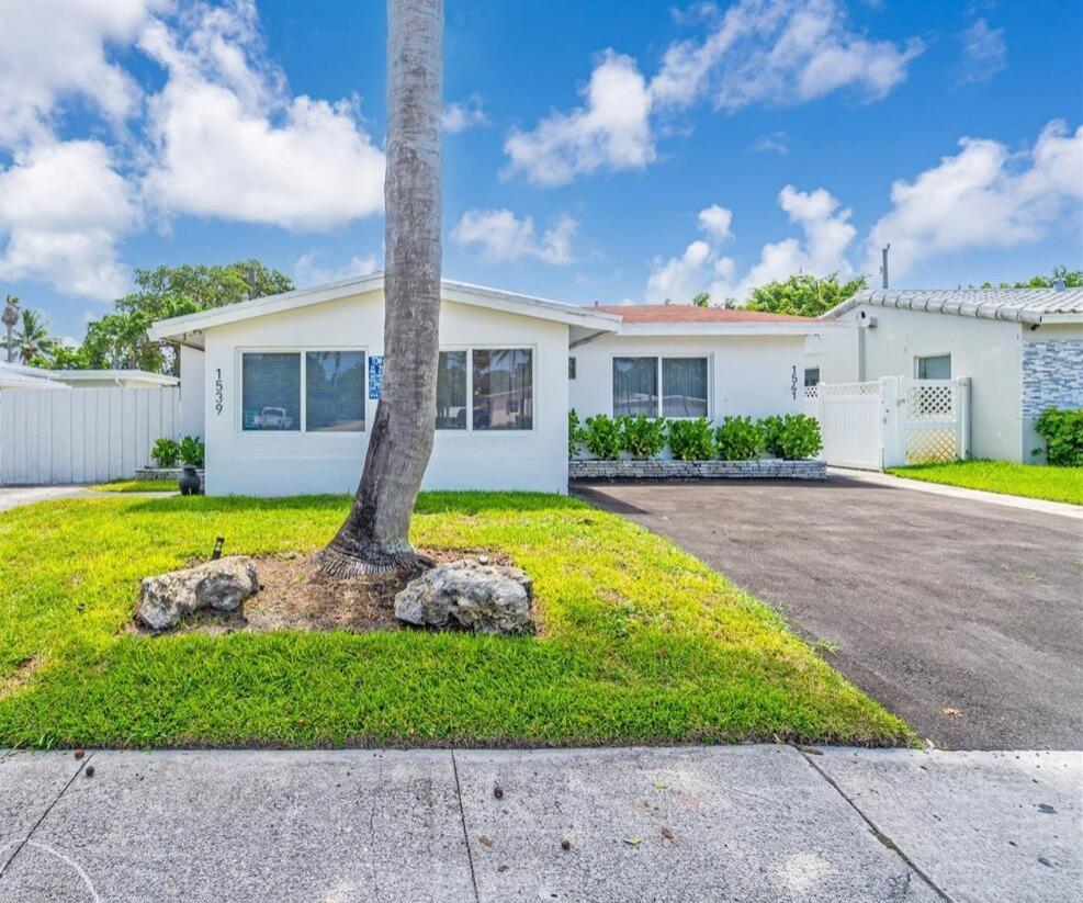 This fully renovated 1-bedroom, 1-bath home is the perfect blend of comfort, charm, and modern upgrades -just 2 miles from the beach, Las Olas, and Downtown Fort Lauderdale. The property features a brand-new roof and impact windows for peace of mind, along with its own private entrance and fenced yard for added privacy. Inside, enjoy brand new tile plank floors, upgraded fixtures, and fresh paint throughout. The kitchen has been completely updated with brand new counters, backsplash, cabinetry, plumbing fixtures, garbage disposal, and stainless-steel appliances, including a new dishwasher and in-unit laundry. This home combines modern upgrades with unbeatable convenience - perfect for anyone looking to enjoy the Fort Lauderdale lifestyle.