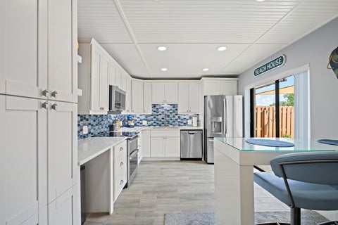 Photo of 6163 SE Riverboat Drive #1018, Stuart, FL 34997 (MLS # B26044813)