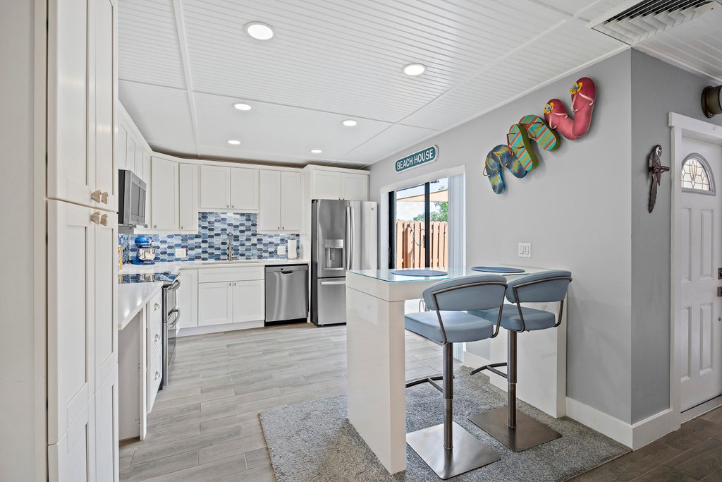 Photo of 6163 SE Riverboat Drive #1018, Stuart, FL 34997 (MLS # B26044813)