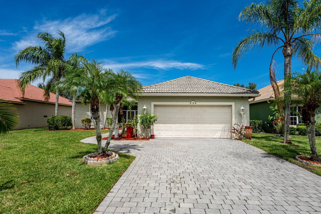 Photo of 334 NW Sheffield Circle, Port Saint Lucie, FL 34983 (MLS # R11097677)