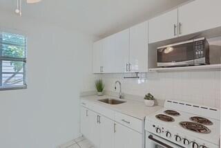 GARDENS THE - Residential Lease