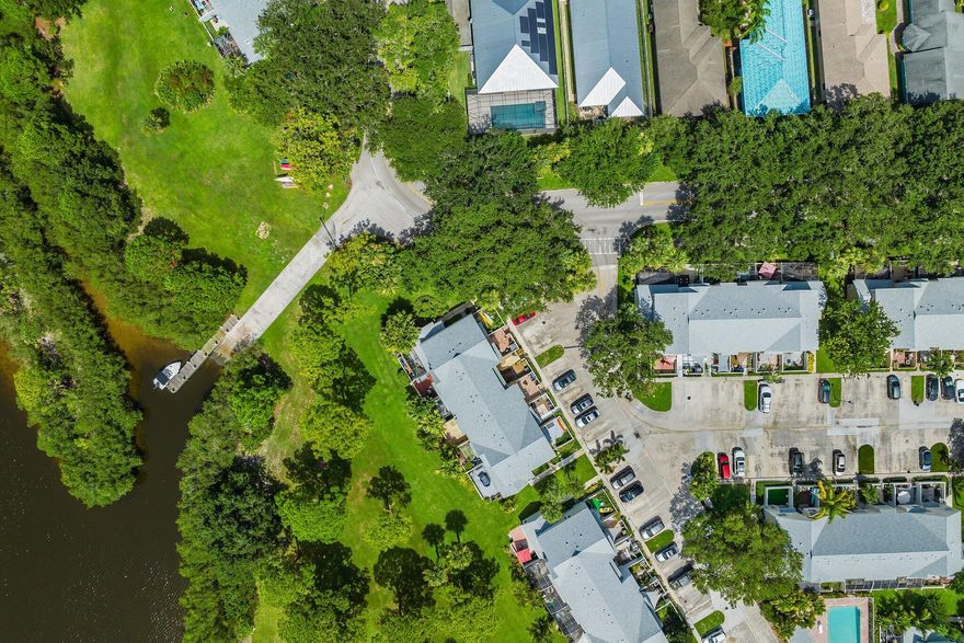 Welcome home to this charming townhouse in the sought-after Riverwalk community! With 2 bedrooms and 2.5 bathrooms, this place is perfect for anyone craving that laid-back Florida lifestyle. The community amenities are seriously impressive — three pools, tennis courts, pickle ball, basketball, a park, and even a dog park for your furry friend. Love the water? You'll dig the kayak stand and private boat launch right at your fingertips. Nestled in the heart of Jupiter, you're minutes from amazing shopping, dining, and gorgeous beaches. Don't let this one slip away — schedule your showing today!