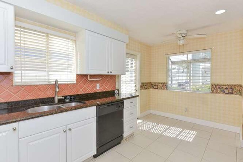 Photo of 6158 Riverwalk Lane #1, Jupiter, FL 33458 (MLS # B26019556)