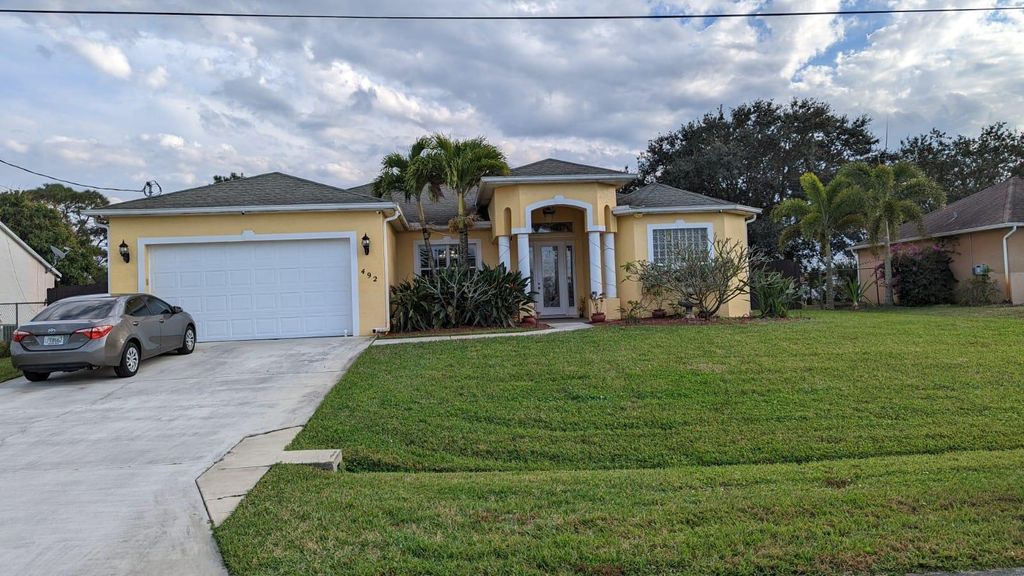 Photo of 492 SW Fifer Avenue, Port Saint Lucie, FL 34953 (MLS # R10777193)