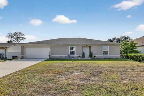 Photo of 644 SW Hoffenberg Avenue, Port Saint Lucie, FL 34953 (MLS # R11146298)