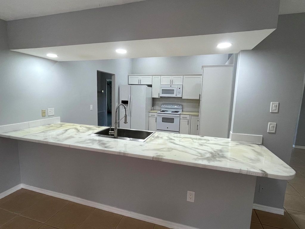 Photo of 2058 SE Camilo Street, Port Saint Lucie, FL 34952 (MLS # R11045138)