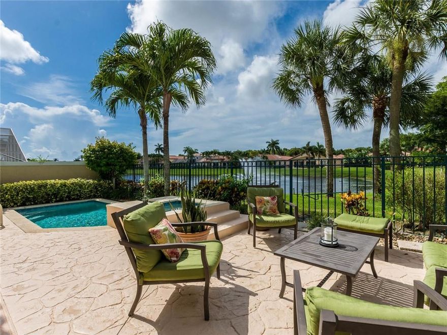 OPEN AIRY AND BRIGHT CUSTOM HOME SITUATED IN SOUGHT AFTER "SANTA BARBARA" FEATURING DESIGNER STONE FLOORS, ROOF 7 YRS OLD, A/C 2YRS NEW VOLUME CEILINGS WITH LOTS OF NATURAL LIGHT AND WINDOWS DRESSED WITH PLANTATION SHUTTERS, EAT IN KITCHENGRANITE AND STAINLESS APPLIANCES, NEW CARPET,  FRESHLY PAINTED INTERIOR AND EXTERIOR, TRANQUIL VIEW OVERLOOKING POOL/SPA AND LAKE, ACCORDIAN SHUTTERS, (PRIMARY BEDROOM ON FIRST FLOOR WITH 2 BEDROOMS UPSTAIRS,  WALKING DISTANCE TO COMMUNITY CLUB HOUSE WITH WONDERFUL AMMENITIES..A MUST SEE TO APPRECIATE!!5 DAY INSPECTION, NO APPRAISAL CONTINGENCY, AS IS WITH RIGHT TO INSPECT(SHOWINGS BEGIN TUESDAY, FEBRUARY 1ST)