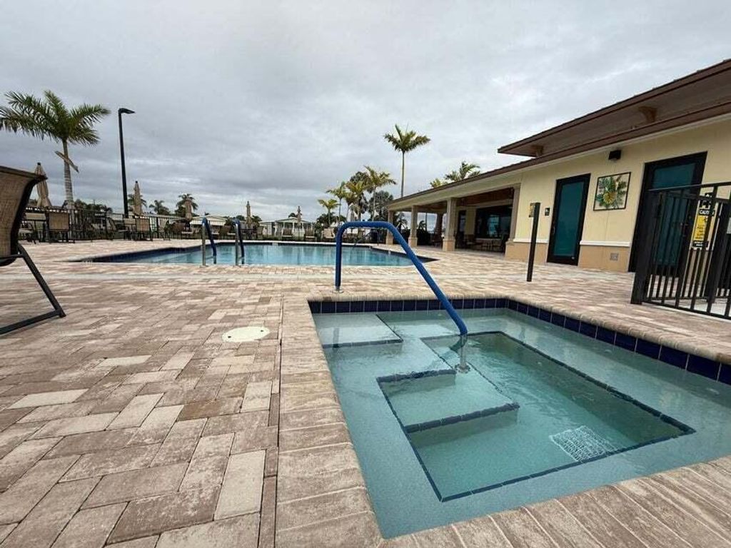 Photo of 6085 Seashore Drive, Atlantis, FL 33462 (MLS # R11168362)