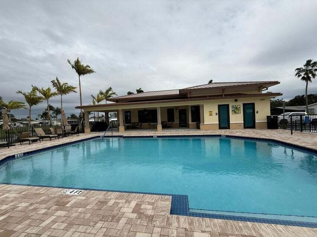 Photo of 6085 Seashore Drive, Atlantis, FL 33462 (MLS # R11168362)