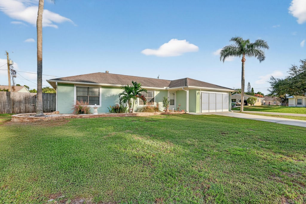 Photo of 398 SW Covington Road, Port Saint Lucie, FL 34953 (MLS # R11136792)