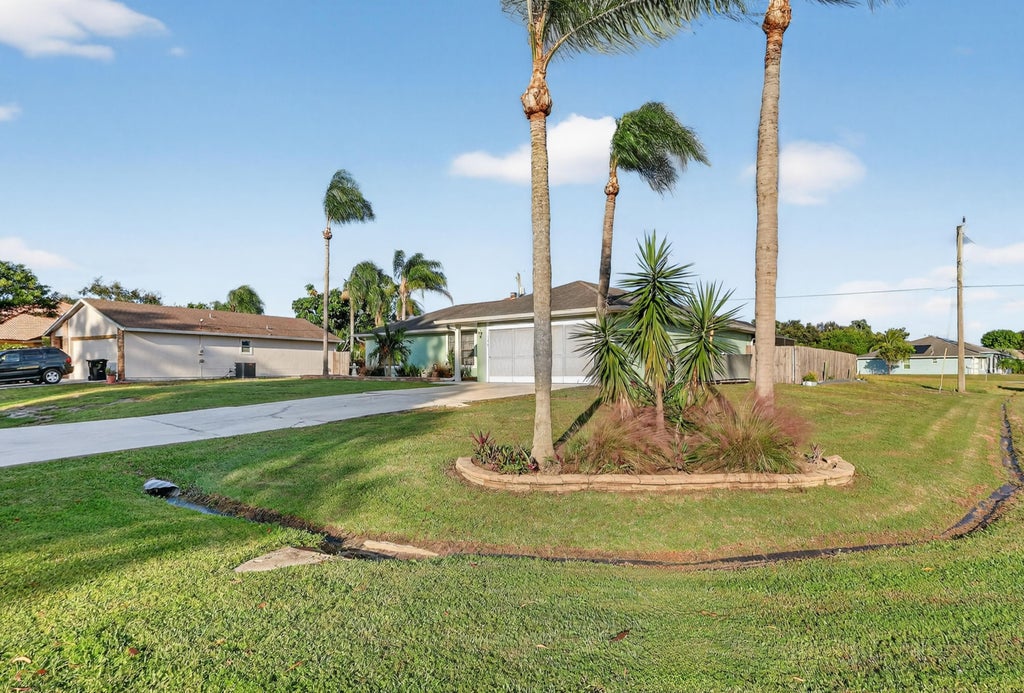 Photo of 398 SW Covington Road, Port Saint Lucie, FL 34953 (MLS # R11136792)