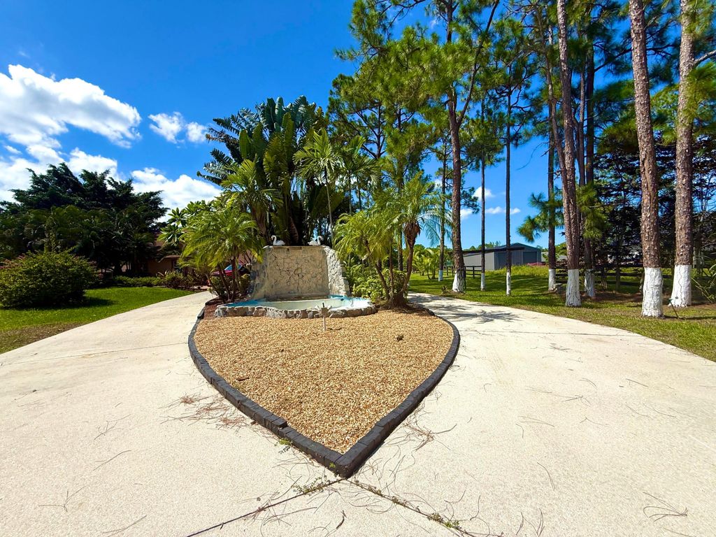 Photo of 14765 Northlake Boulevard, The Acreage, FL 33412 (MLS # R11110358)