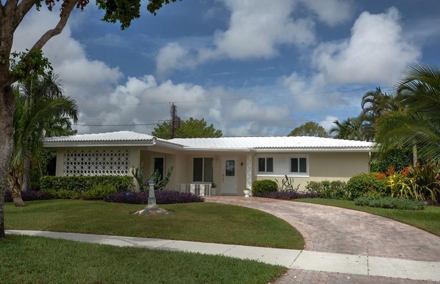 Immaculate Imperial Point Home!  2/2  Heated Pool Home with lush, private back yard is great for entertaining.  Impact Glass and Doors, Open Kitchen, Terracotta Tile Floors, updated kitchen and baths, Kohler fixtures, make this an easy place to call home.  Located in one of the most desirable areas of Imperial Point with easy access to Federal Highway.  Great closet space.  Priced to Sell.