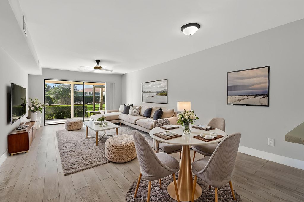 Photo of 901 Pinecrest Circle #C, Jupiter, FL 33458 (MLS # R11167630)