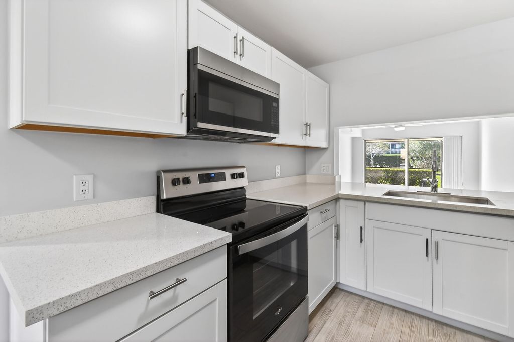 Photo of 901 Pinecrest Circle #C, Jupiter, FL 33458 (MLS # R11167630)