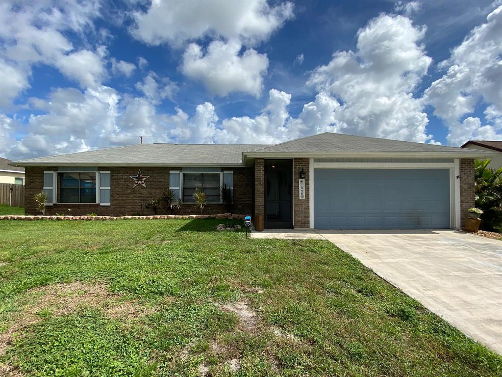Photo of 1049 SW Aswan Avenue, Port Saint Lucie, FL 34953 (MLS # R10734262)