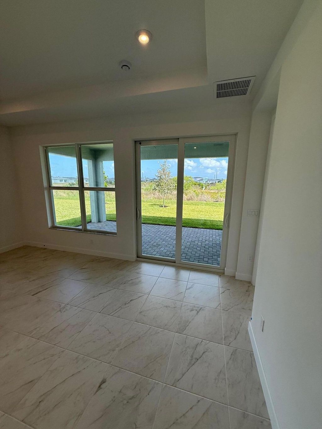 Photo of 13509 SW Bally Drive, Port Saint Lucie, FL 34987 (MLS # B26015116)