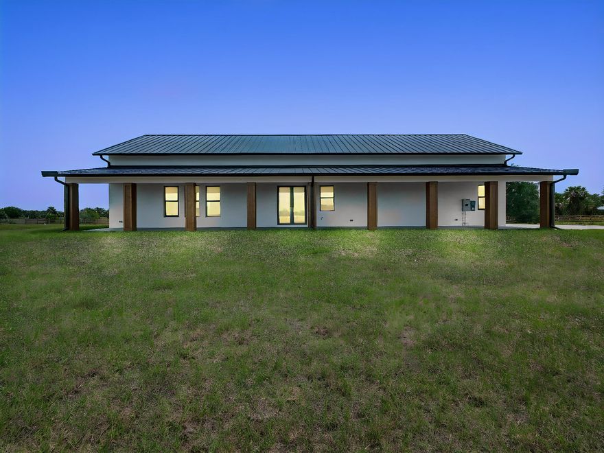15.5 ACRES - Trade city limits for wide-open freedom. This rare gem in Port St. Lucie is your chance to build grow, and live exactly how you want with agricultural zoning and no HOA.  Add/Create your dream estate with a pool, convert the unit to a barndominium, an equestrian setup, or modern homestead with room for horses, cows, goats, and a chicken coop. Picture mornings in your garden beds, afternoons fishing in your private pond, and endless space for RVs, boats, and all other toys! You're also just minutes from the highway, top golf options like PGA Golf Club, and the upcoming KOA Bay Surf Club—bringing surfing, yoga, and more nearby/coming soon.   Space, freedom, and lifestyle all in one. Schedule your private showing to become a 15+ acre land owner today!