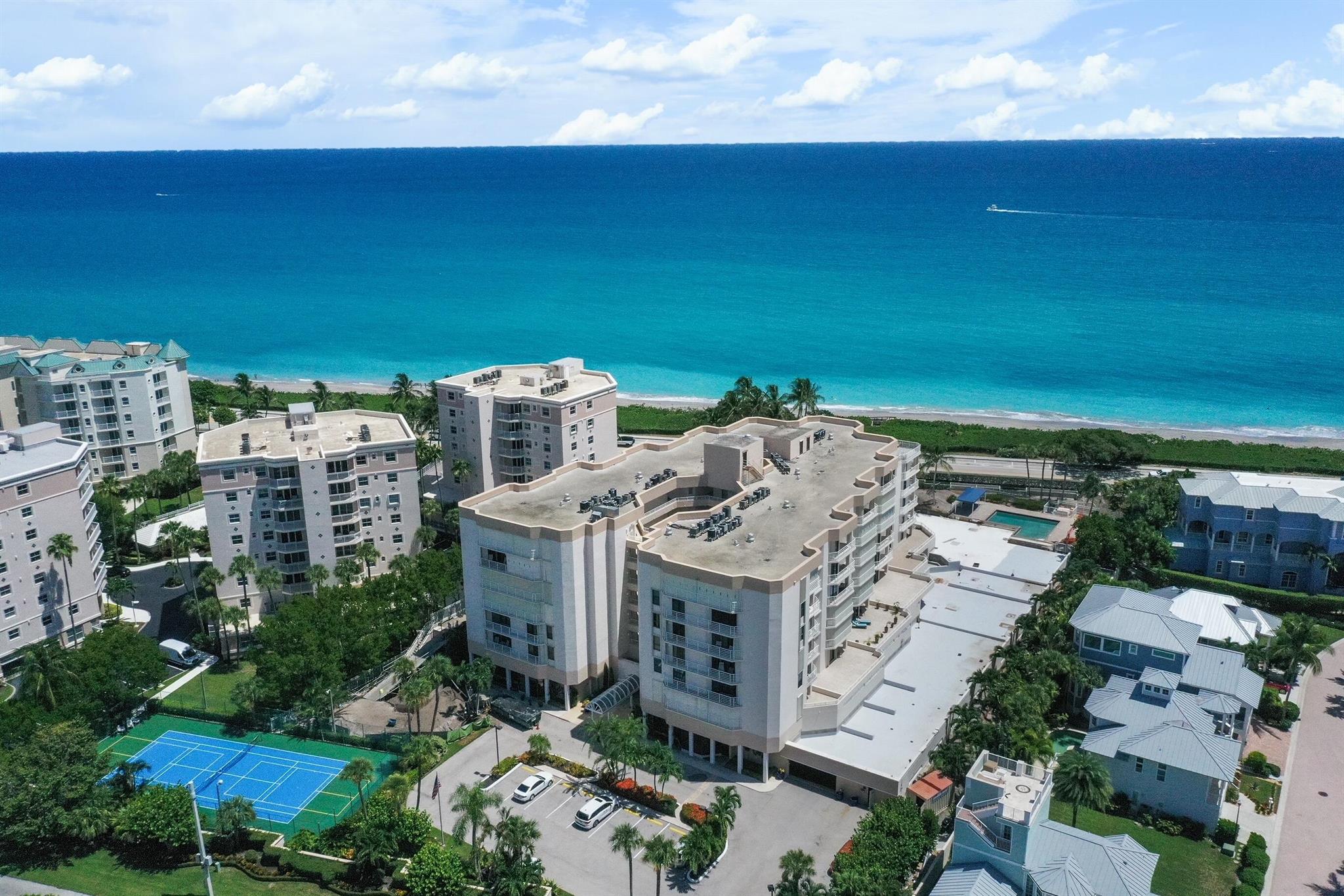 Light-filled & spacious is this luxurious OCEANFRONT 2-bedroom, 2-bathroom residence beautifully maintained, featuring a HUGE private patio, with over 1400 living sq feet, BRAND NEW A/C (2024), READY for you to renovate and make it your own. Located in the prestigious Corinthians condo, located in the heart of Jupiter! You will enjoy resort-style amenities including a sparkling pool, state-of-the-art fitness center, garage parking, extra storage, beach chair and baggage storage, club room, library, and on-site management -- all just minutes from Jupiter's top restaurants and shopping destinations.
