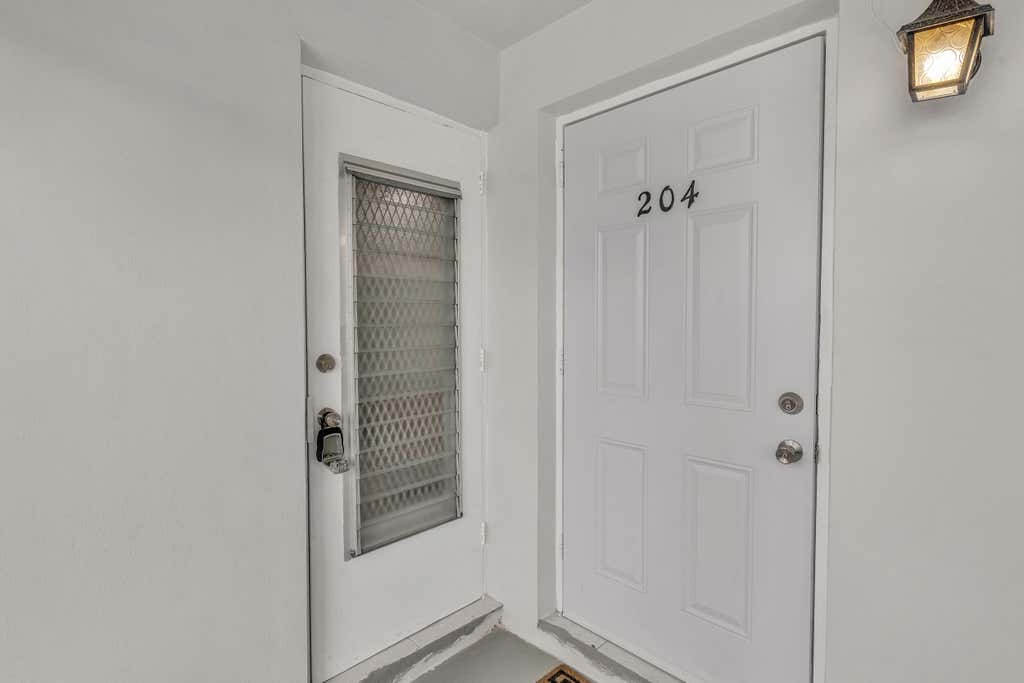 Photo of 651 PINE Drive #204, Pompano Beach, FL 33060 (MLS # B26066280)