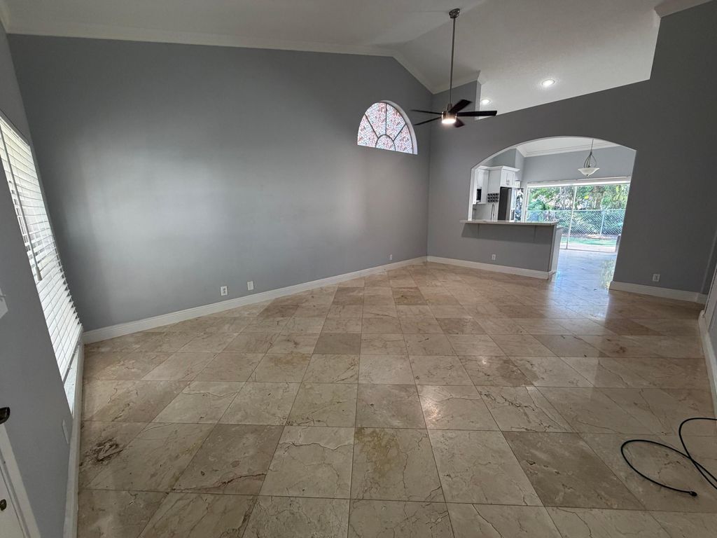 Photo of 7657 Sanctuary Drive, Coral Springs, FL 33065 (MLS # B26026960)