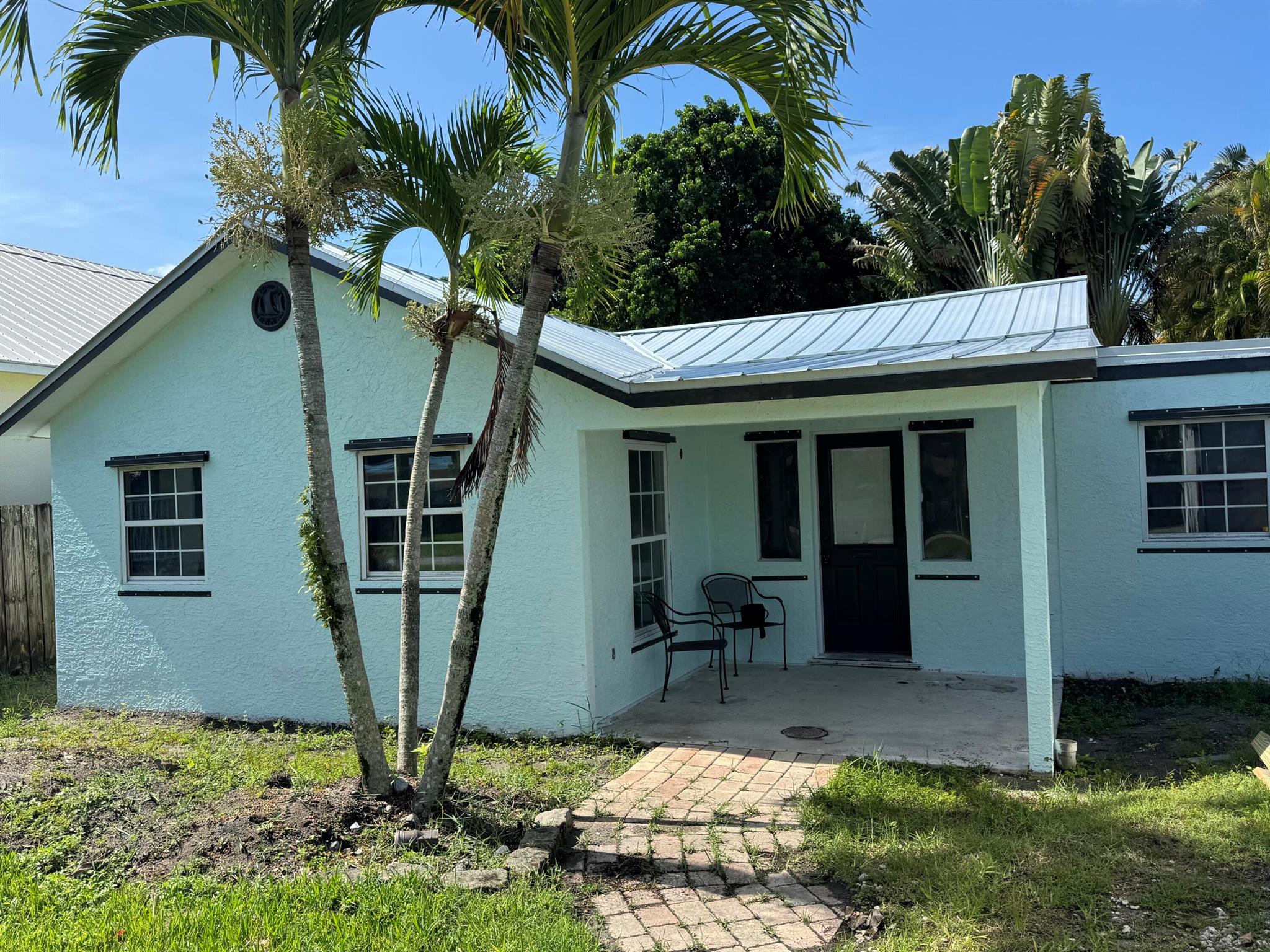 Investor/Developer dream in the heart of Old Palm City CRA! This 3BD/2BA home is 80% complete with major upgrades done in 2024: new roof, grading, foundation supports, electrical, plumbing, A/C, and tankless water heater. Finish to suit and capitalize on the surrounding revitalization, including the Map Road redevelopment, master plan enhancements, and new community lakefront pavilion. No HOA, excellent location near top-rated schools, parks, boat ramps, and shopping. A rare opportunity to finish and flip, rent, or create your dream home in a rapidly improving neighborhood.