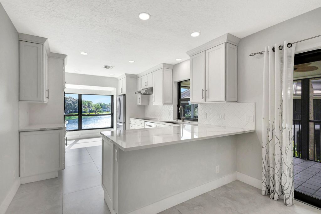 Photo of 3940 Back Bay Drive #241, Jupiter, FL 33477 (MLS # B26008117)