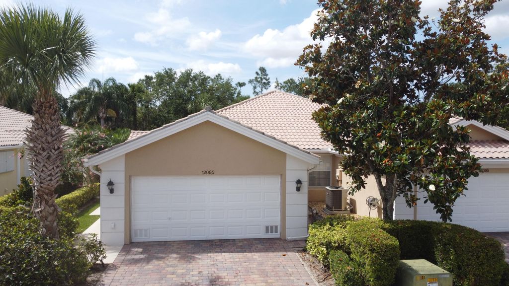 Photo of 12085 SW Elsinore Drive Dr, Port St Lucie, FL 34987 (MLS # R10801969)